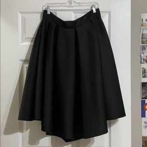 plus size pleated mid length skirt